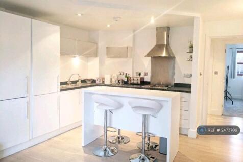 Open Kitchen With 4 Bar Stools