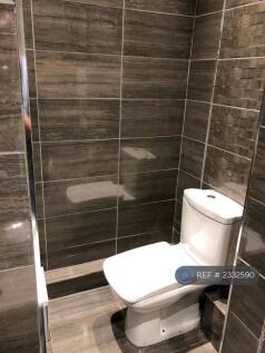 Fully Tiled Modern Bathroom 