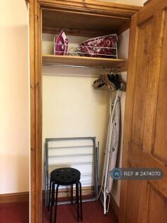 Wardrobe With Ironing Board And Iron 