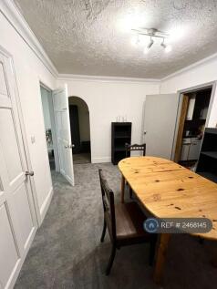Dining Room With Access To Laundry And Kitchen