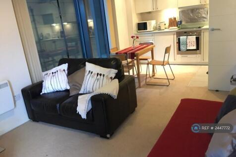 Living Room With Open Plan Dining Kitchen