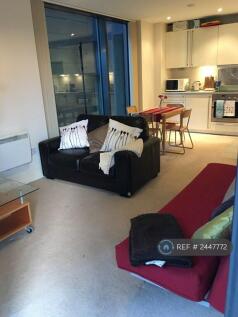 Living Room With Open Plan Dining Kitchen