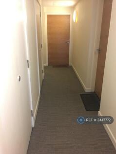 Commuanl Hallway Leading To Flat