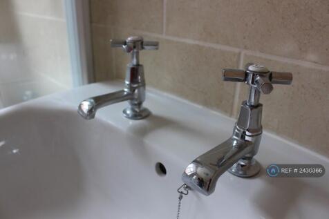Fully Tiled Bathroom