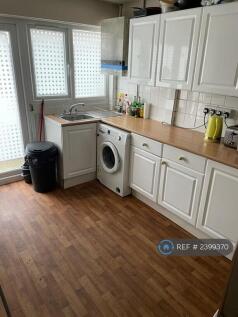 Kitchen With Washing Machine