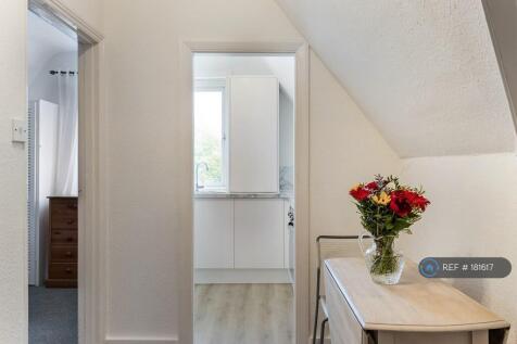 Hallway Looking Into Bedroom And Kitchen