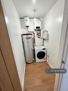Store Room w/ Combination Washer/Dryer