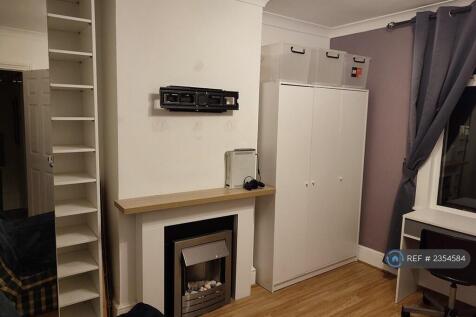 Three Door Wardrobe And Generous Folding Cupboard