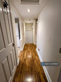 Hallway Leading To Bathroom And Bedroom 1.