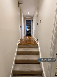 Hallway Leading To Reception Room.