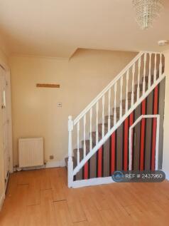Porch Leading To Living Room And Stairs