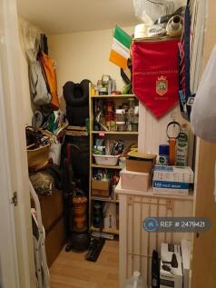 Large Storage Cupboard In Hallway