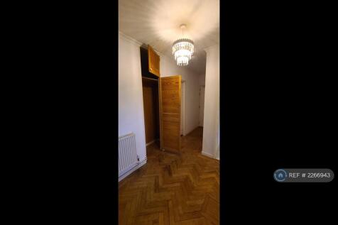 Coat Cupboard In Hallway.