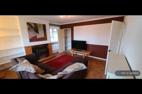 Living Room From Balcony With Storage Cupboard
