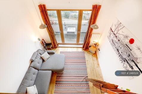 View From Split Level Downwards Onto Living Room 