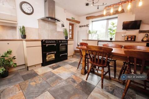 Large Range, 7 Burners And 3 Ovens