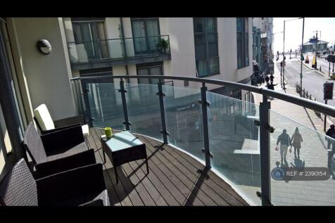 Balcony With Wooden Decking And Easy Care Seating