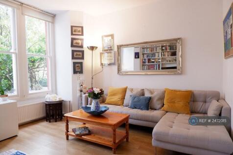 Living Room Furnished With Large l-Shaped Sofa