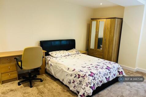 Bedroom 1 With Wardrobe And Side Table