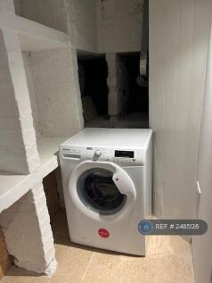 Washing Machine In Utility