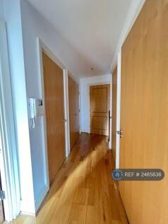 Hallway With Utility Cupboard And Storage