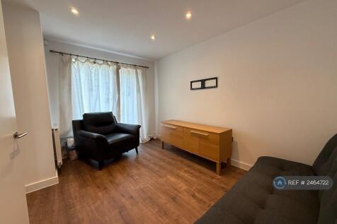 Family Lounge With a Patio Door