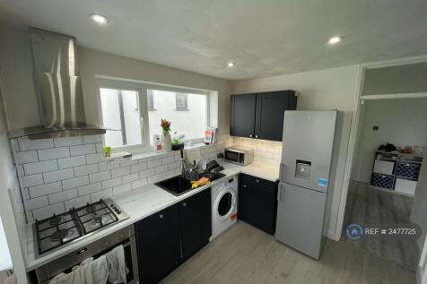 Modern Kitchen With White Goods Included 