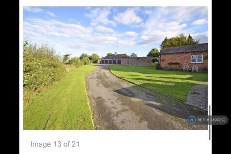 The Drive Leads To Garages