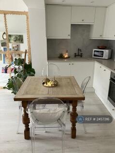 Solid Wood Extending Dining Table, Kartell Chairs