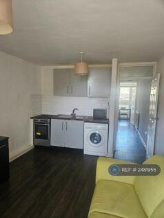 Living Room And Open Plan Kitchenette