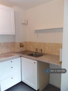 Kitchen Sink / Cupboards Under.