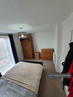 Second Bedroom (Pictured With King-Size Bed)