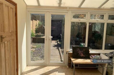 Conservatory &amp; View Of Garden