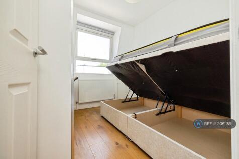 Ottoman Storage In Smaller Bedroom