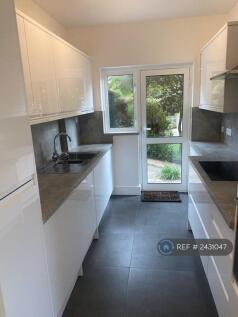 Shiny New Kitchen With Door To Garden
