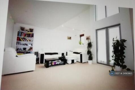 Living Room With High Ceilings