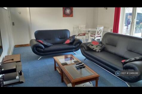 Large Lounge With Patio Doors To Garden