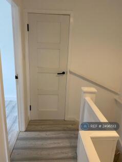 Door To Upstairs Storage Cupboard