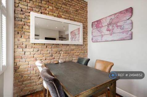 Dining Area Bathed In Natural Light