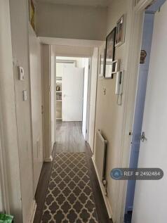 Hallway With 3 Storage Cabinets