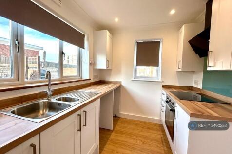 Newly Fitted Kitchen With Cooker And Induction Hob