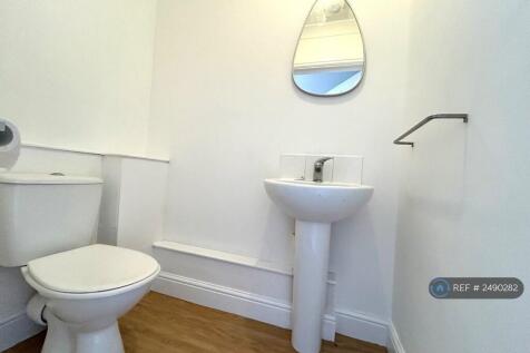 Downstairs Bathroom With Toilet And Basin