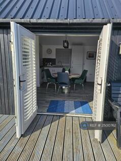 Outside Looking Into Kitchen Dinning Area