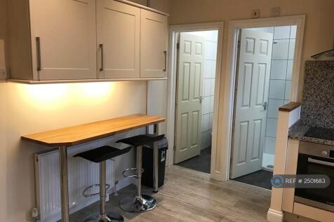 Large Kitchen With Breakast Bench And Table