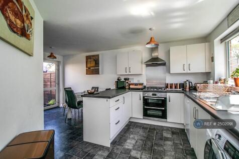 Spacious Kitchen With Side Pantry