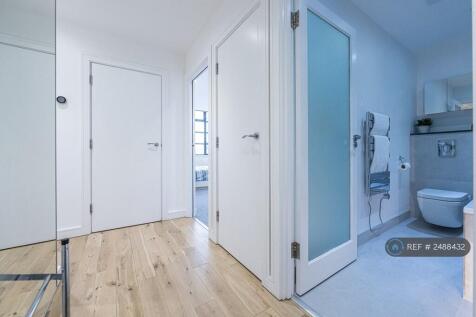 Entryway (Storage Cupboard On The Right)