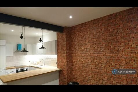 Exposed Steel Beam And Pulley Lights