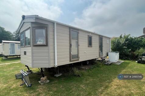Exterior (Trim And Steps Being Installed)