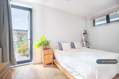 Bedroom With Door To Balcony