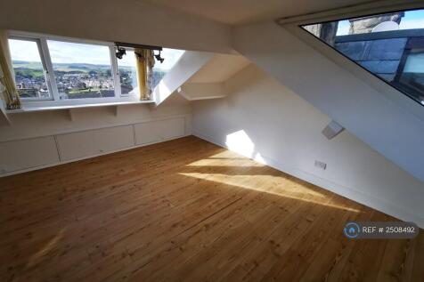 Attic Room With Expansive Views Front And Rear.
